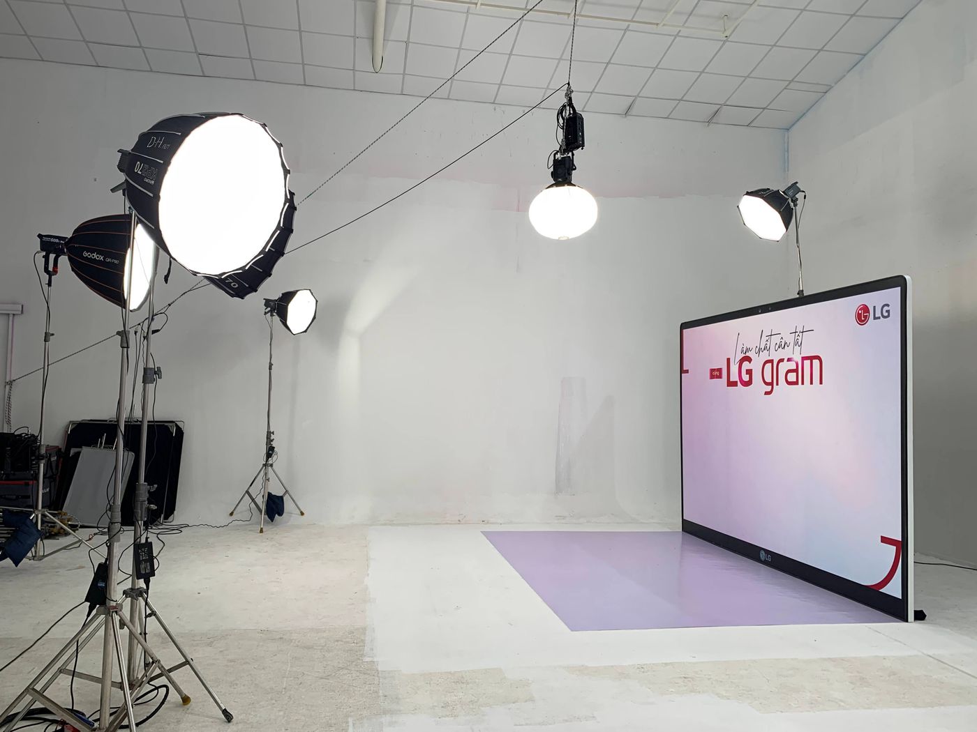 Professional photography studio with camera and softbox lighting